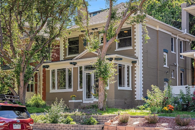 1419 N Adams St, Denver, CO 80206 - view of front facade featuring brick siding