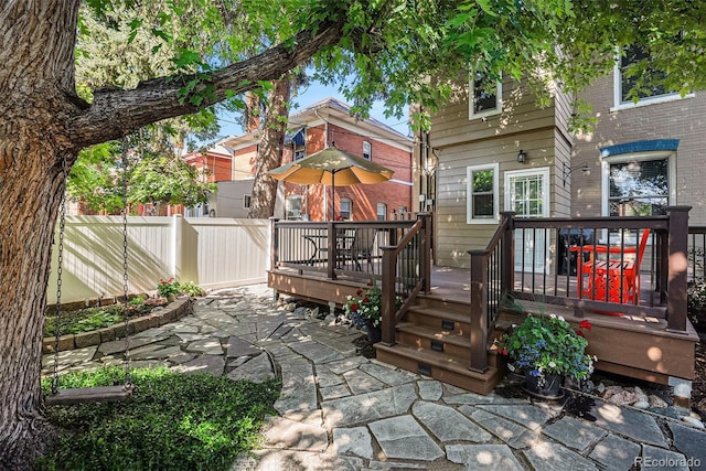 1419 N Adams St, Denver, CO 80206 - rear view of property featuring a wooden deck and a patio