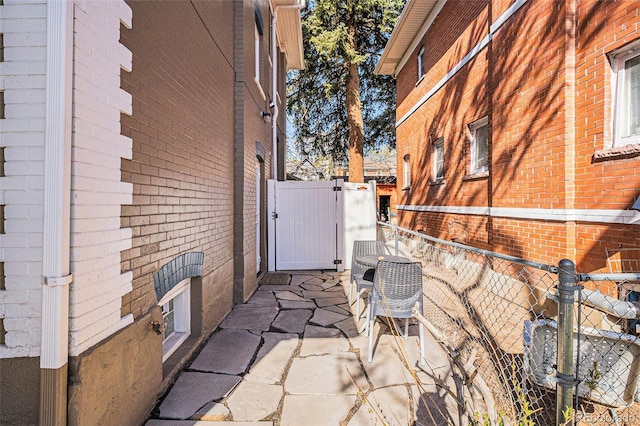 1419 N Adams St, Denver, CO 80206 - view of patio featuring a gate