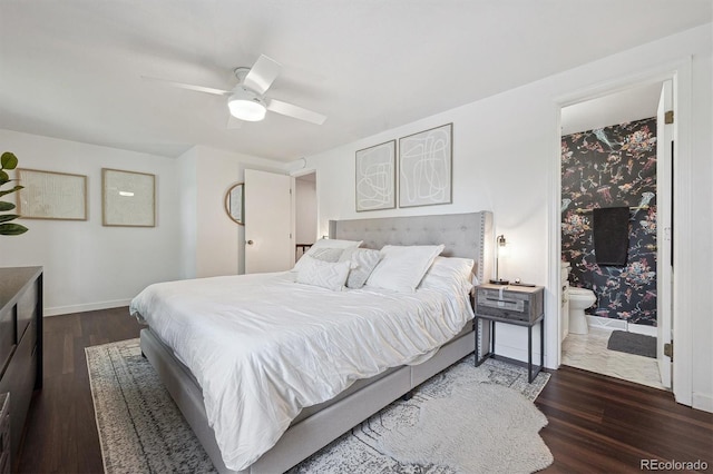 8981 E Amherst Dr Unit E, Denver, CO 80231 - bedroom featuring wood finished floors, baseboards, ensuite bath, and ceiling fan