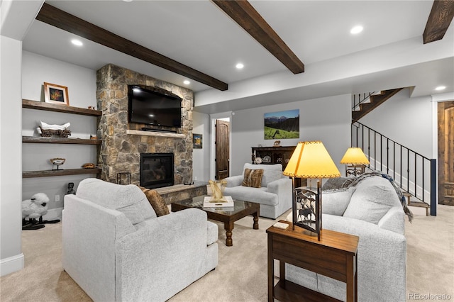 8326 Raphael Ln, Littleton, CO 80125 - living area with light colored carpet, stairway, beamed ceiling, a stone fireplace, and recessed lighting