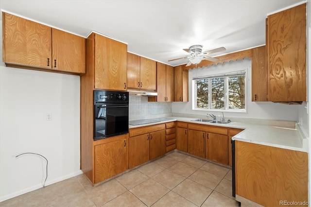 kitchen with sink, light tile patterned floors, black appliances, and ceiling fan