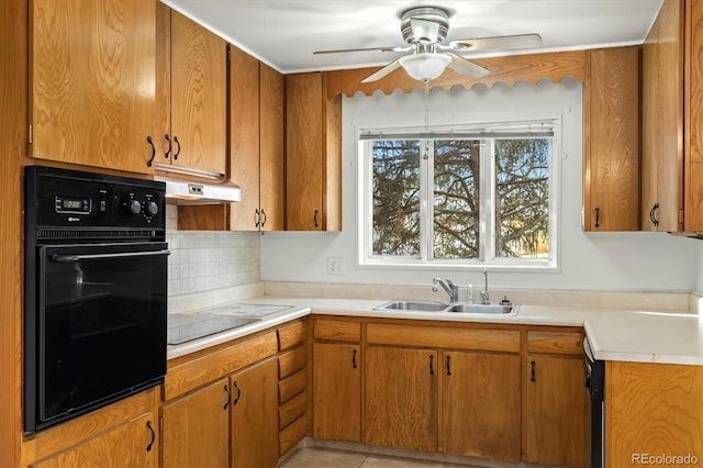 kitchen featuring sink, ceiling fan, and black appliances