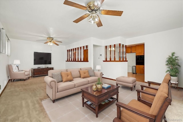 living room featuring ceiling fan