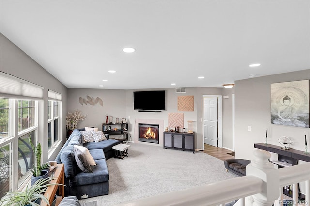 4912 S Fultondale Way, Aurora, CO 80016 - living room featuring recessed lighting, a fireplace, and carpet floors