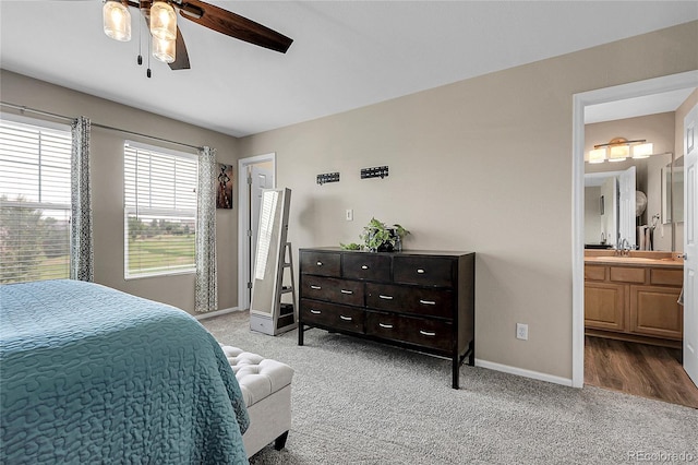4912 S Fultondale Way, Aurora, CO 80016 - carpeted bedroom with ensuite bath and ceiling fan