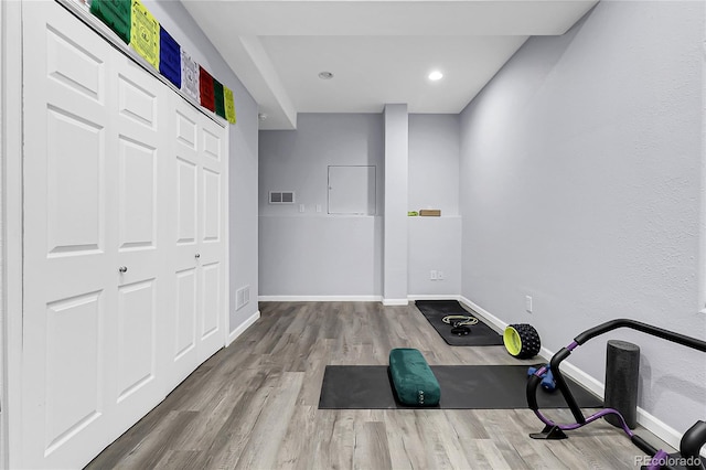 4912 S Fultondale Way, Aurora, CO 80016 - exercise room featuring wood finished floors and recessed lighting