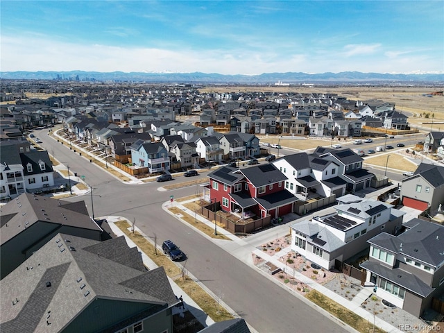 bird's eye view featuring a mountain view and a residential view