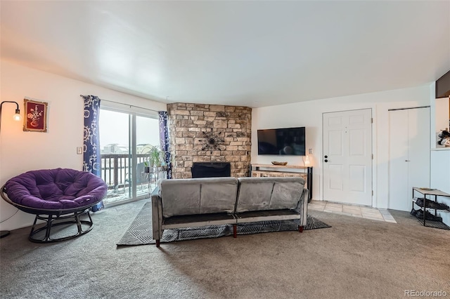 living room with a fireplace and light colored carpet