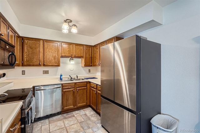 kitchen featuring stainless steel appliances and sink