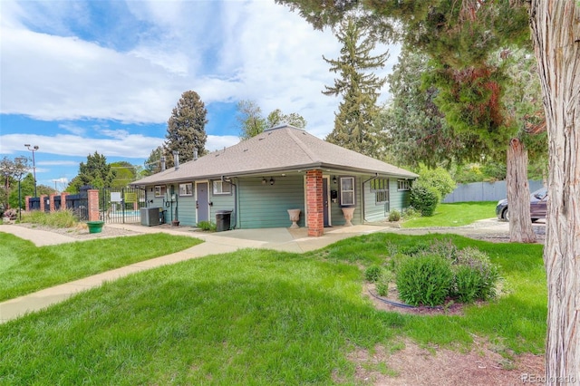 3518 S Depew St Unit 102, Lakewood, CO 80235 - view of front facade with a patio area and cooling unit