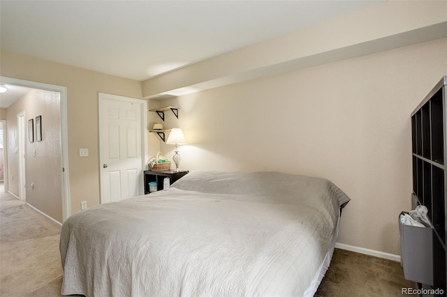 3518 S Depew St Unit 102, Lakewood, CO 80235 - carpeted bedroom featuring baseboards