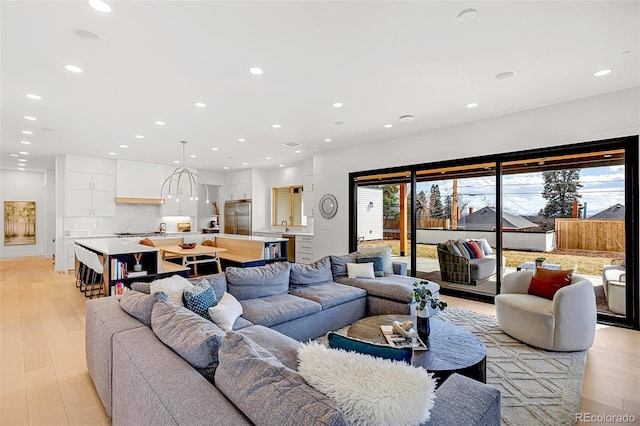 4520 W Moncrieff Pl, Denver, CO 80212 - living area featuring recessed lighting and light wood-style flooring