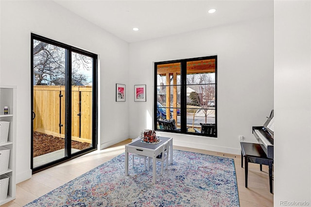 4520 W Moncrieff Pl, Denver, CO 80212 - office space featuring plenty of natural light, wood finished floors, and recessed lighting