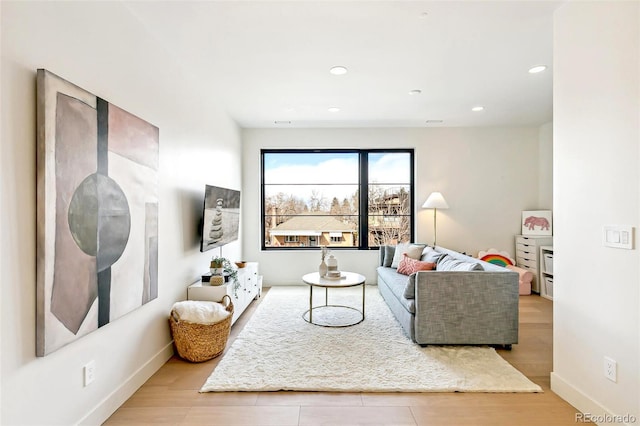 4520 W Moncrieff Pl, Denver, CO 80212 - living room featuring recessed lighting and wood finished floors