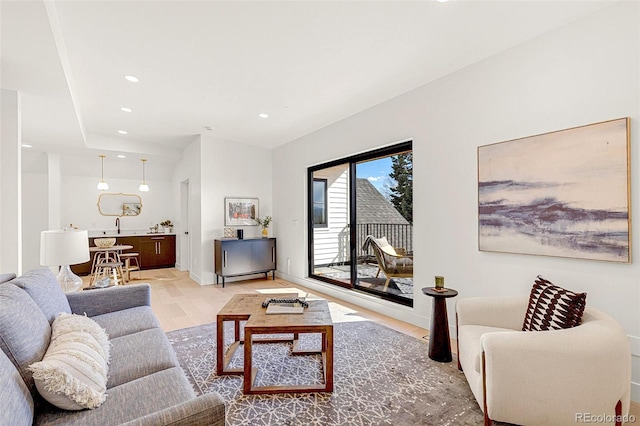 4520 W Moncrieff Pl, Denver, CO 80212 - living room with wood finished floors and recessed lighting
