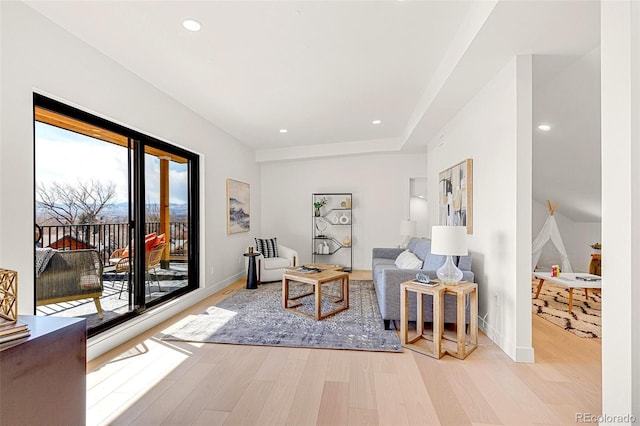 4520 W Moncrieff Pl, Denver, CO 80212 - living room with light wood-type flooring and recessed lighting