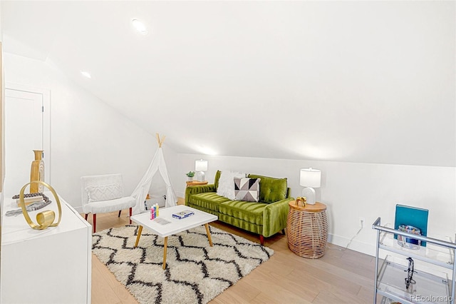 4520 W Moncrieff Pl, Denver, CO 80212 - living area with vaulted ceiling and wood finished floors