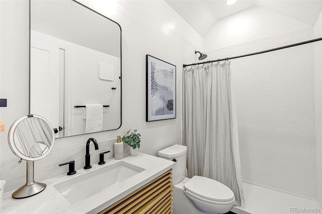 4520 W Moncrieff Pl, Denver, CO 80212 - full bathroom featuring tiled shower, vanity, and lofted ceiling