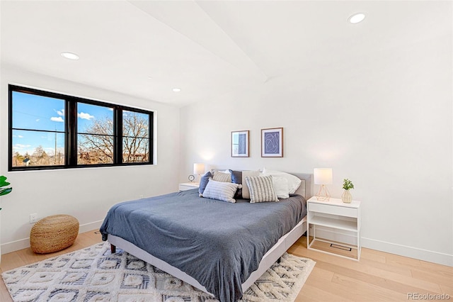4520 W Moncrieff Pl, Denver, CO 80212 - bedroom with wood finished floors and recessed lighting