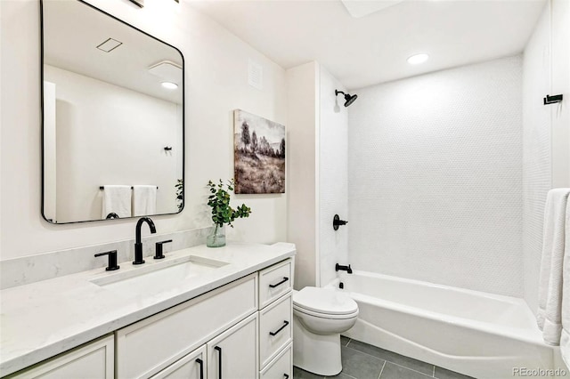 4520 W Moncrieff Pl, Denver, CO 80212 - bathroom with vanity, shower / bathtub combination, tile patterned flooring, and recessed lighting