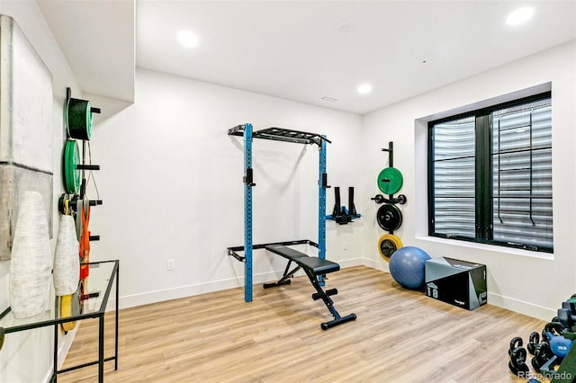 4520 W Moncrieff Pl, Denver, CO 80212 - exercise room with wood finished floors and recessed lighting