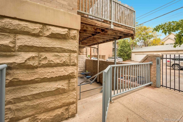 1140 Columbine St Unit 106, Denver, CO 80206 - view of patio with an outdoor structure and a garage