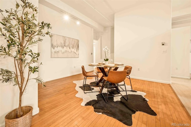 1140 Columbine St Unit 106, Denver, CO 80206 - dining area with light wood-style floors