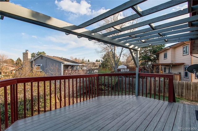 wooden terrace with a pergola