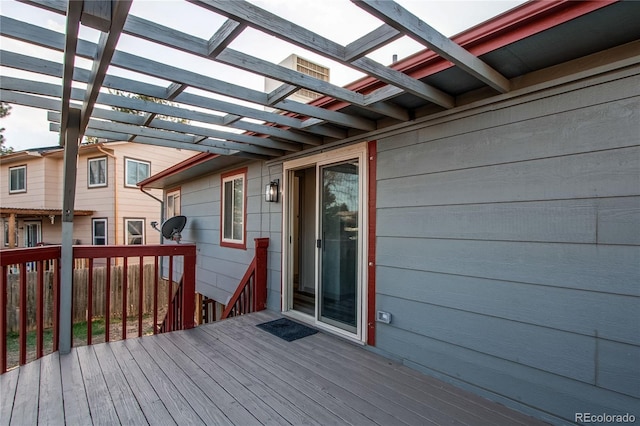 wooden deck with a pergola
