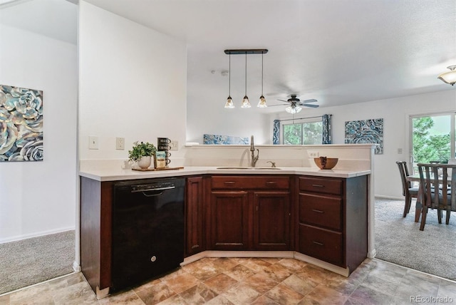 kitchen with black dishwasher, pendant lighting, ceiling fan, sink, and light carpet