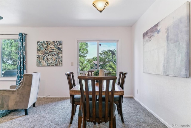 view of carpeted dining room