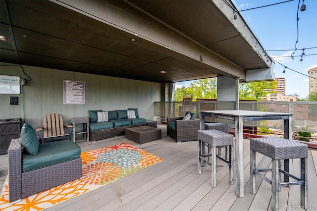 wooden deck with an outdoor hangout area