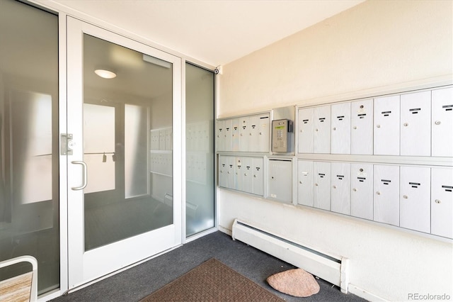 75 N Emerson St Unit 104, Denver, CO 80218 - property entrance with a baseboard radiator