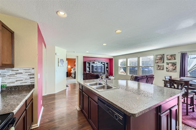 5280 Raritan Way, Denver, CO 80221 - kitchen featuring dishwasher, open floor plan, dark wood-type flooring, plenty of natural light, and a textured ceiling