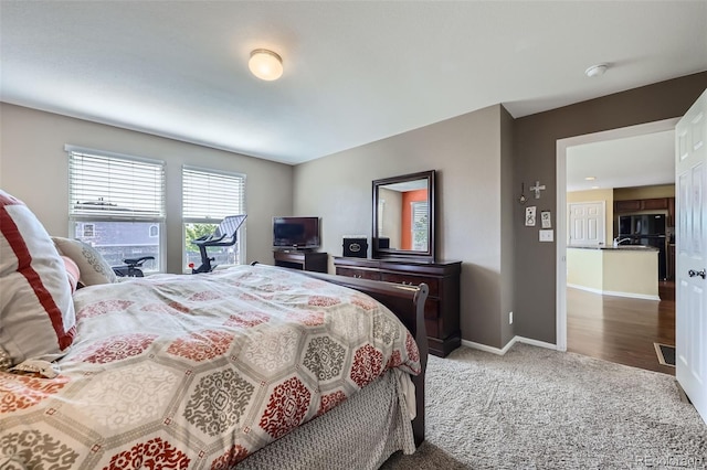 5280 Raritan Way, Denver, CO 80221 - bedroom with carpet flooring and fridge