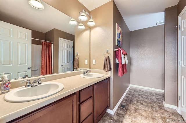 5280 Raritan Way, Denver, CO 80221 - bathroom with double vanity and a shower with curtain