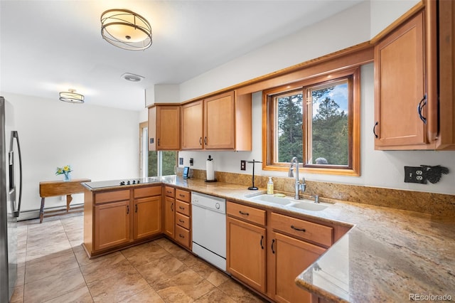 11608 Apache Trl, Conifer, CO 80433 - kitchen with white dishwasher, a sink, a peninsula, and plenty of natural light