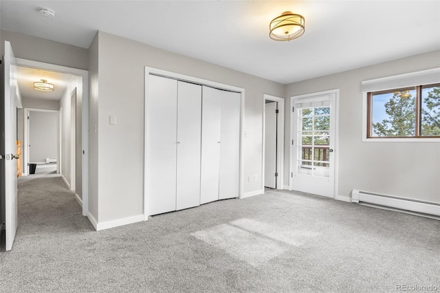11608 Apache Trl, Conifer, CO 80433 - unfurnished bedroom with carpet floors, baseboards, a closet, and a baseboard heating unit