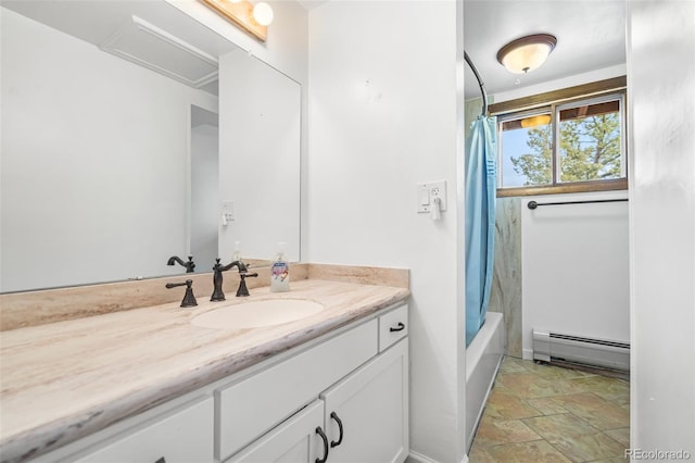 11608 Apache Trl, Conifer, CO 80433 - bathroom with baseboard heating, stone finish floors, vanity, and shower / bathtub combination with curtain
