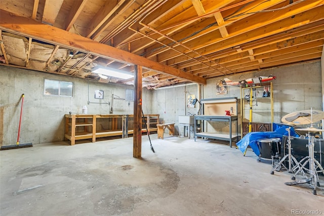 11608 Apache Trl, Conifer, CO 80433 - unfinished below grade area featuring a workshop area