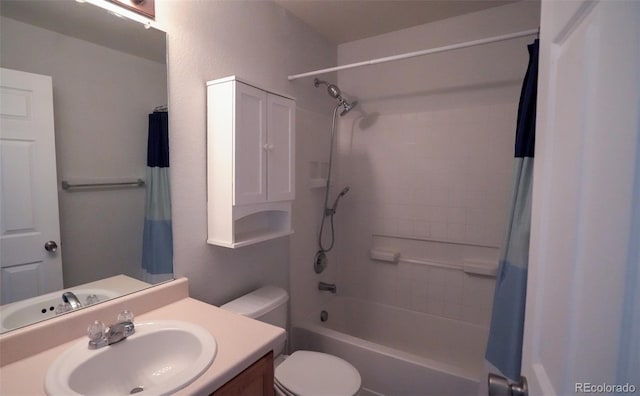 bathroom featuring shower / bath combo, vanity, and toilet