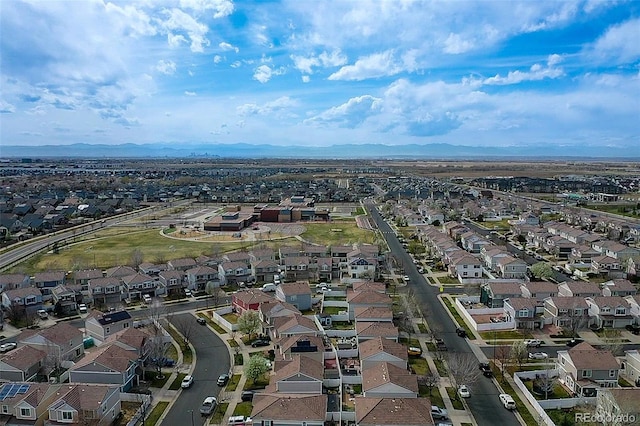 drone / aerial view featuring a mountain view and a residential view
