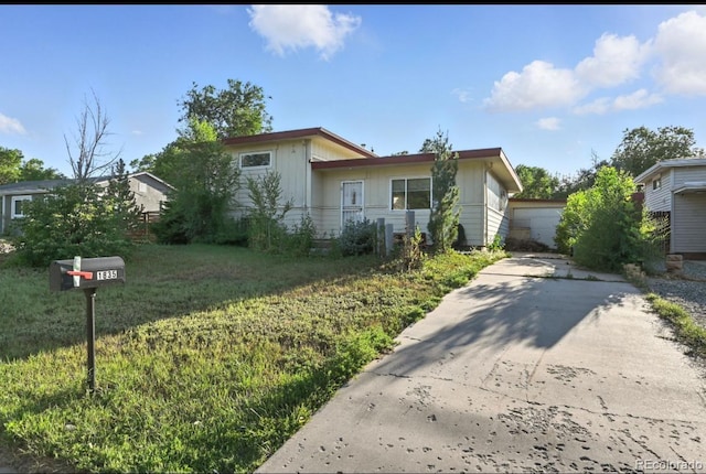 1835 Ingalls St, Lakewood, CO 80214 - view of front of property with a front yard