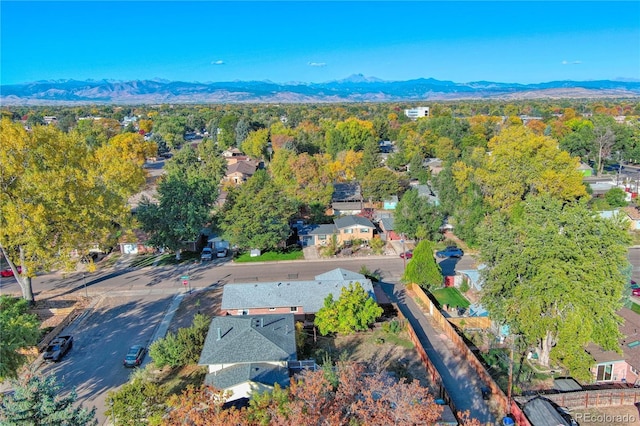 birds eye view of property featuring a mountain view