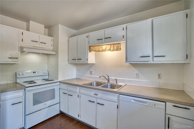 kitchen featuring sink, white cabinets, white appliances, and dark hardwood / wood-style flooring