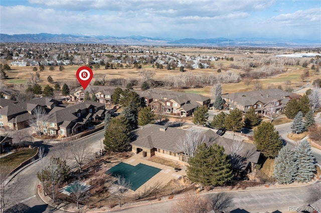 drone / aerial view featuring a mountain view