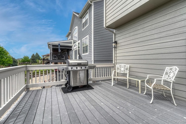 12059 S Tallkid Ct, Parker, CO 80138 - wooden terrace with area for grilling