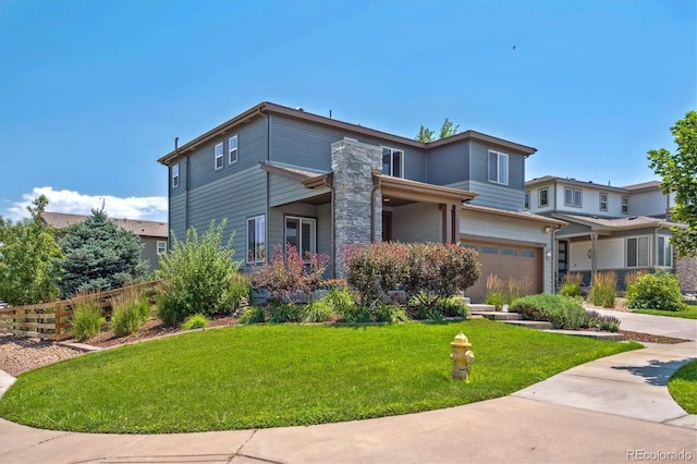 10844 Telluride St, Commerce City, CO 80022 - view of front of house with an attached garage and concrete driveway