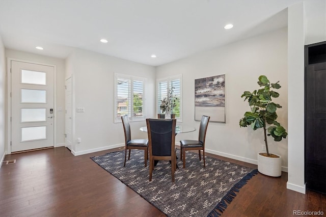 10844 Telluride St, Commerce City, CO 80022 - dining space with wood finished floors and recessed lighting